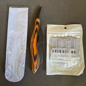 Orange and Black Folding Knife